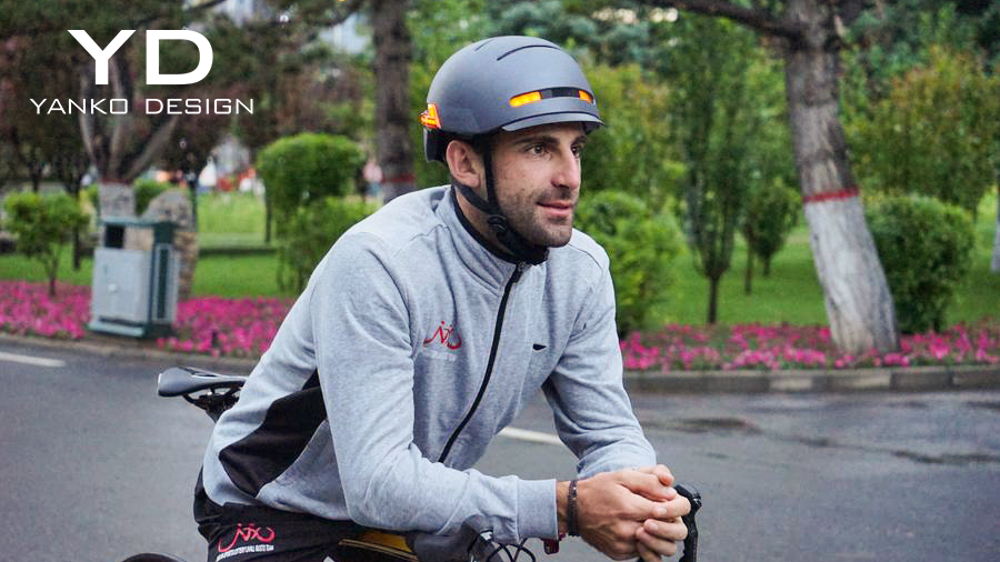 THIS SMART HELMET HAS A BUILT-IN HEADLIGHT, A 270° TAILLIGHT, AND CAN EVEN SEND EMERGENCY SOS ALERTS